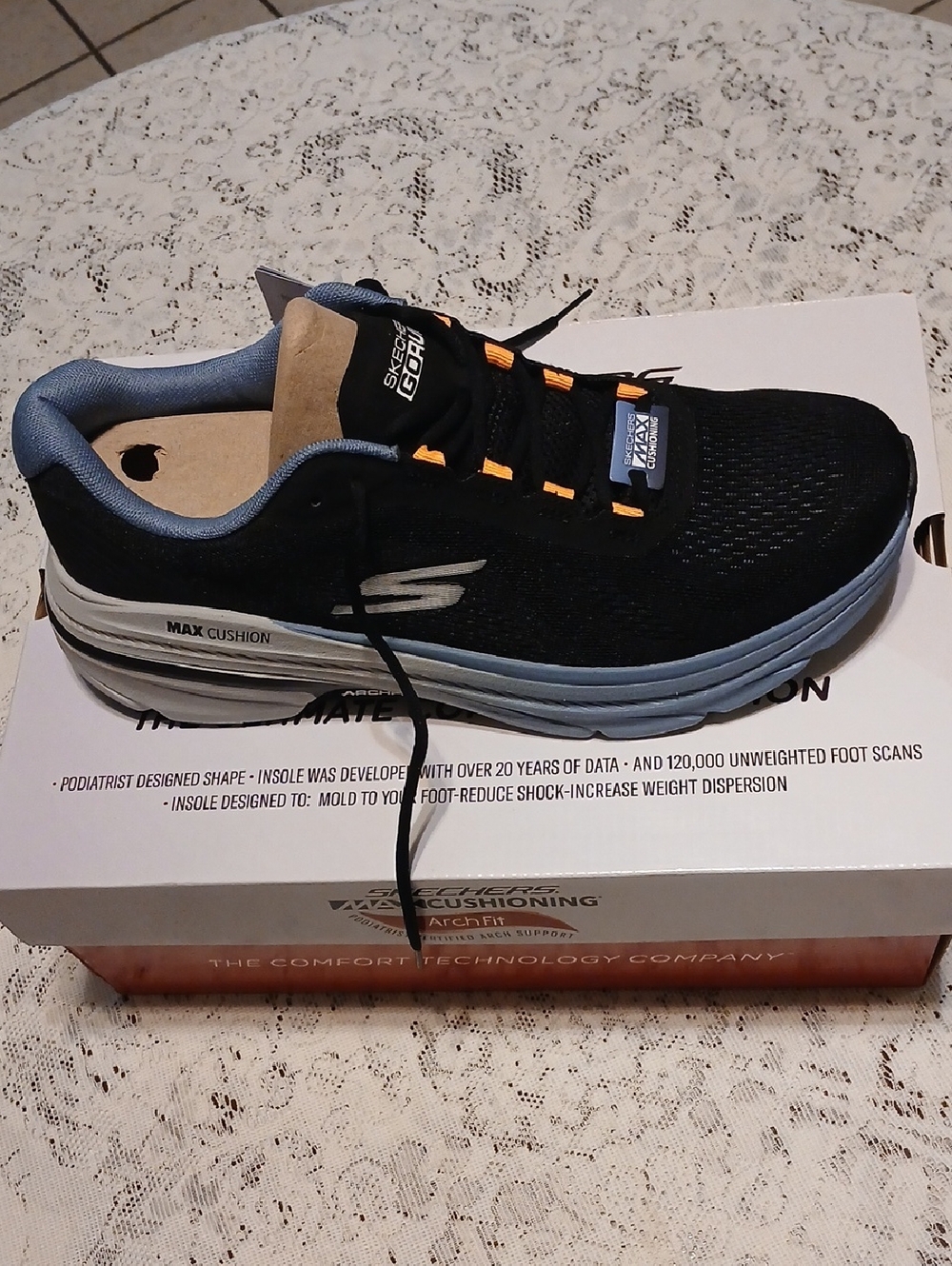 Skechers Men’s Black & Light Blue Max Cushion Walking Shoe with Orange Accents